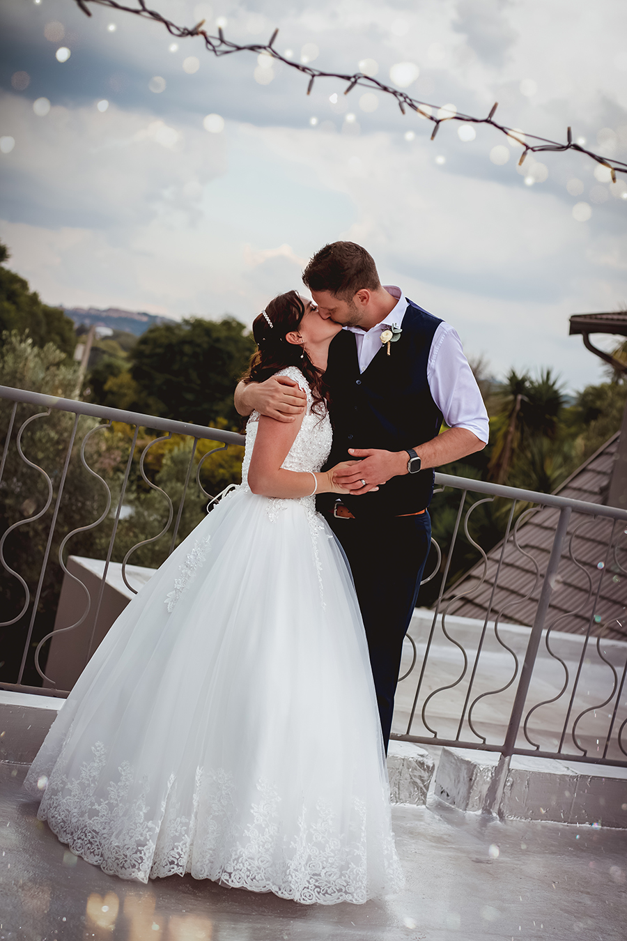 bride and groom kiss